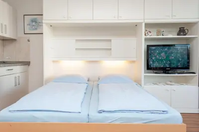 Ein Bett oder Betten in einem Zimmer der Unterkunft Haus Hanseatic, Wohnung 107