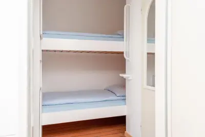 Ein Bett oder Betten in einem Zimmer der Unterkunft Haus Hanseatic, Wohnung 107