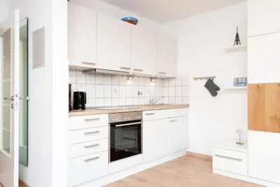 Küche/Küchenzeile in der Unterkunft Haus Hanseatic, Wohnung 111