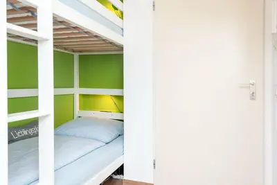 Ein Bett oder Betten in einem Zimmer der Unterkunft Haus Hanseatic, Wohnung 111