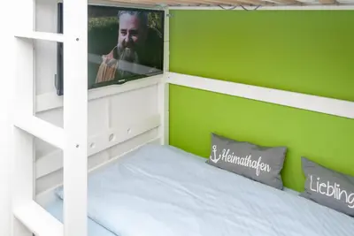 Ein Bett oder Betten in einem Zimmer der Unterkunft Haus Hanseatic, Wohnung 111