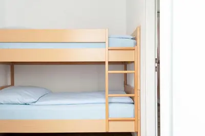 Ein Bett oder Betten in einem Zimmer der Unterkunft Haus Hanseatic, Wohnung 201
