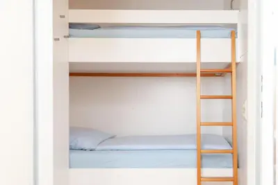 Ein Etagenbett oder Etagenbetten in einem Zimmer der Unterkunft Haus Hanseatic, Wohnung 202