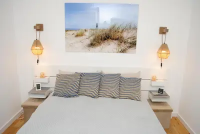 Ein Bett oder Betten in einem Zimmer der Unterkunft Haus Hanseatic, Wohnung 212