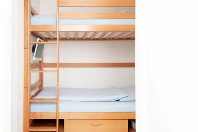 Ein Bett oder Betten in einem Zimmer der Unterkunft Haus Hanseatic, Wohnung 209