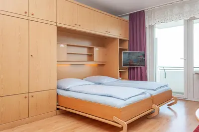 Ein Bett oder Betten in einem Zimmer der Unterkunft Haus Hanseatic, Wohnung 309