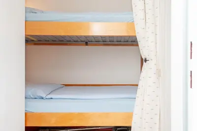 Ein Bett oder Betten in einem Zimmer der Unterkunft Haus Hanseatic, Wohnung 304