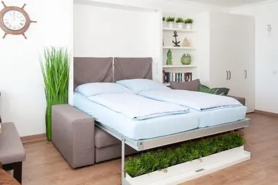 Ein Bett oder Betten in einem Zimmer der Unterkunft Haus Hanseatic, Wohnung 310