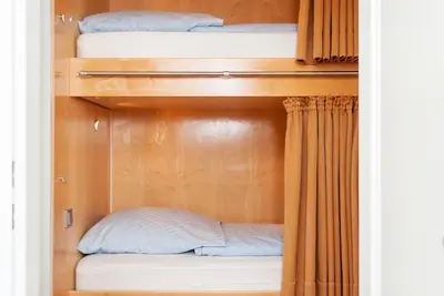 Ein Bett oder Betten in einem Zimmer der Unterkunft Haus Hanseatic, Wohnung 409