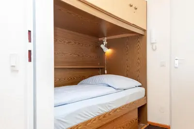 Ein Bett oder Betten in einem Zimmer der Unterkunft Haus Hanseatic, Wohnung 312