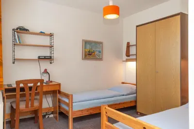 Ein Bett oder Betten in einem Zimmer der Unterkunft Haus Hanseatic, Wohnung 312