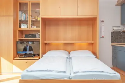 Ein Bett oder Betten in einem Zimmer der Unterkunft Haus Hanseatic, Wohnung 404