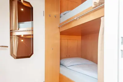 Ein Bett oder Betten in einem Zimmer der Unterkunft Haus Hanseatic, Wohnung 404