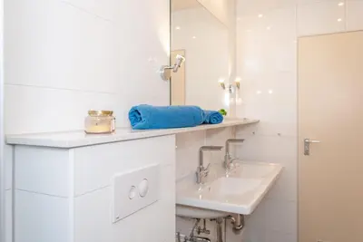 Ein Badezimmer in der Unterkunft Haus Hanseatic, Wohnung 509