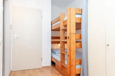 Ein Bett oder Betten in einem Zimmer der Unterkunft Haus Hanseatic, Wohnung 503