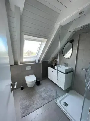 Ein Badezimmer in der Unterkunft Nordseetraum - Ferienhaus Wolke