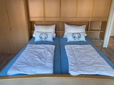 Ein Bett oder Betten in einem Zimmer der Unterkunft Schwiemann