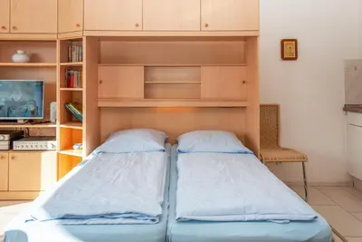 Ein Bett oder Betten in einem Zimmer der Unterkunft Haus Hanseatic, Wohnung 604