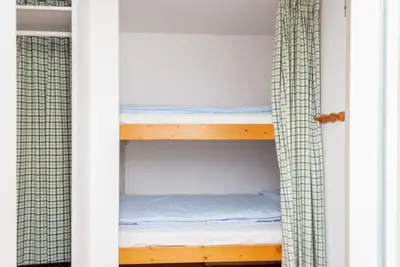 Ein Bett oder Betten in einem Zimmer der Unterkunft Haus Hanseatic, Wohnung 610