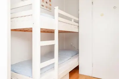 Ein Bett oder Betten in einem Zimmer der Unterkunft Haus Hanseatic, Wohnung 710