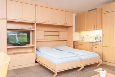 Ein Bett oder Betten in einem Zimmer der Unterkunft Haus Hanseatic, Wohnung 702