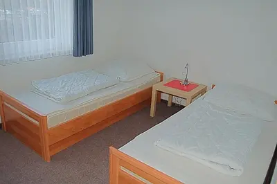 Ein Bett oder Betten in einem Zimmer der Unterkunft Seepferdchen