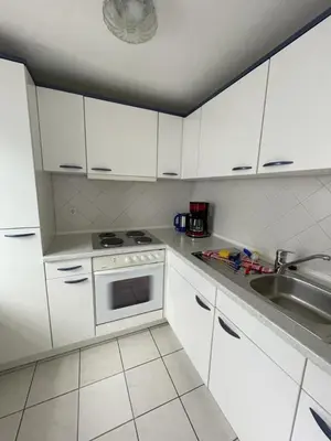 Küche/Küchenzeile in der Unterkunft Badehausallee 20 Bungalow