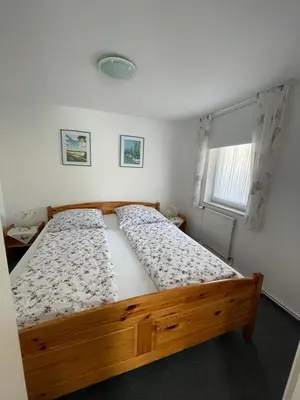 Ein Bett oder Betten in einem Zimmer der Unterkunft Badehausallee 20 Bungalow
