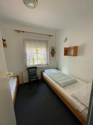 Ein Bett oder Betten in einem Zimmer der Unterkunft Haus Nordseegruß 3
