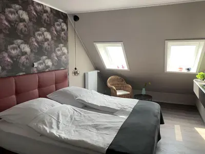 Ein Bett oder Betten in einem Zimmer der Unterkunft Seaside, Hohenzollernstr. 30 Wohnung 302