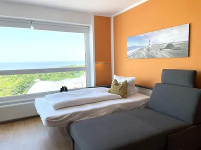 Ein Bett oder Betten in einem Zimmer der Unterkunft Frische Brise FeWo12.09