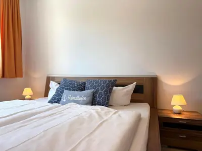 Ein Bett oder Betten in einem Zimmer der Unterkunft Haus am Waldbad Whg. 14/5