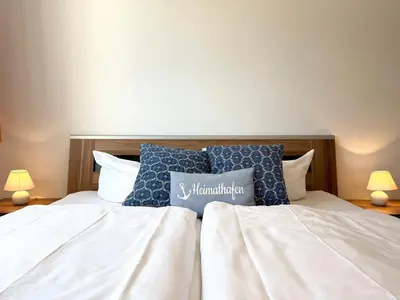 Ein Bett oder Betten in einem Zimmer der Unterkunft Haus am Waldbad Whg. 14/5