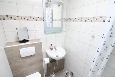 Ein Badezimmer in der Unterkunft Haus Hachtmann