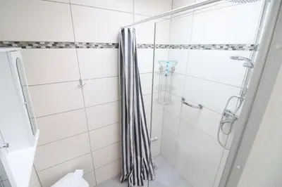 Ein Badezimmer in der Unterkunft Haus Hachtmann