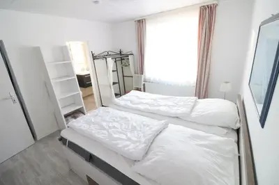 Ein Bett oder Betten in einem Zimmer der Unterkunft Haus Hachtmann