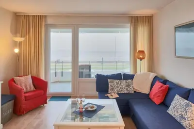 Ein Sitzbereich in der Unterkunft Nautilus, Ferienwohnung 13 inkl Strandkorb