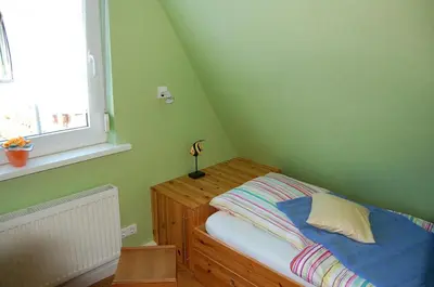 Ein Bett oder Betten in einem Zimmer der Unterkunft Christian-Brütt-Weg 42