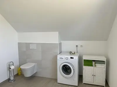 Ein Badezimmer in der Unterkunft Ferienwohnungen EBBE und FLUT - Niedrigenergiehaus