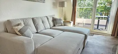 Ein Sitzbereich in der Unterkunft Windstärke 1