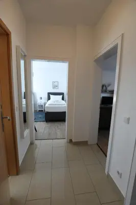 Ein Bett oder Betten in einem Zimmer der Unterkunft Rugenbargsweg 27 Whg 1